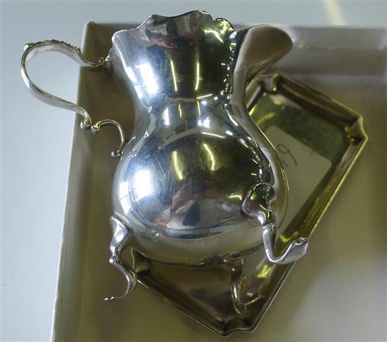 Silver cream jug, small dish and sherry label